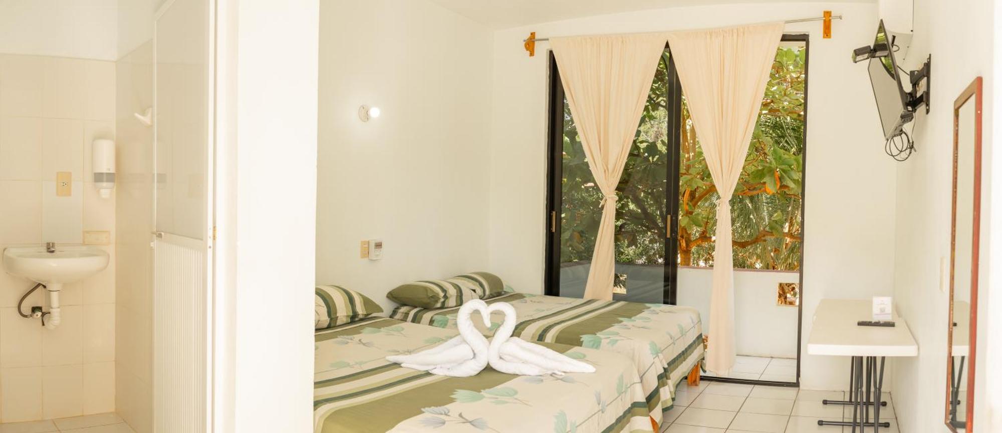 Hotel Palmarito ปูแอร์โตเอสกอนดิโด ภายนอก รูปภาพ