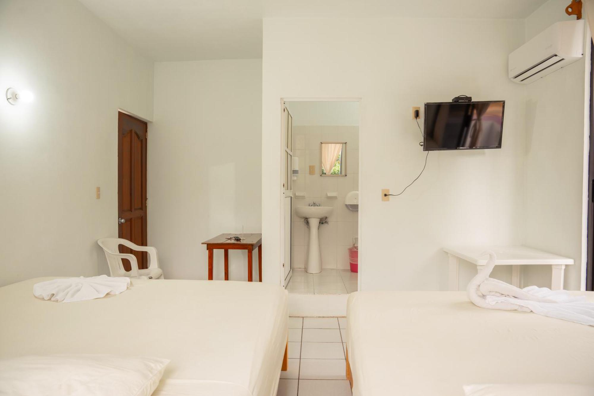 Hotel Palmarito ปูแอร์โตเอสกอนดิโด ภายนอก รูปภาพ
